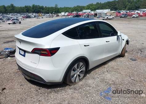 2023 Tesla Model Y Awd/Long Range Dual Motor All-Wheel Drive z USA, uszkodzony, nr VIN 7SAYGDEE8PA077608